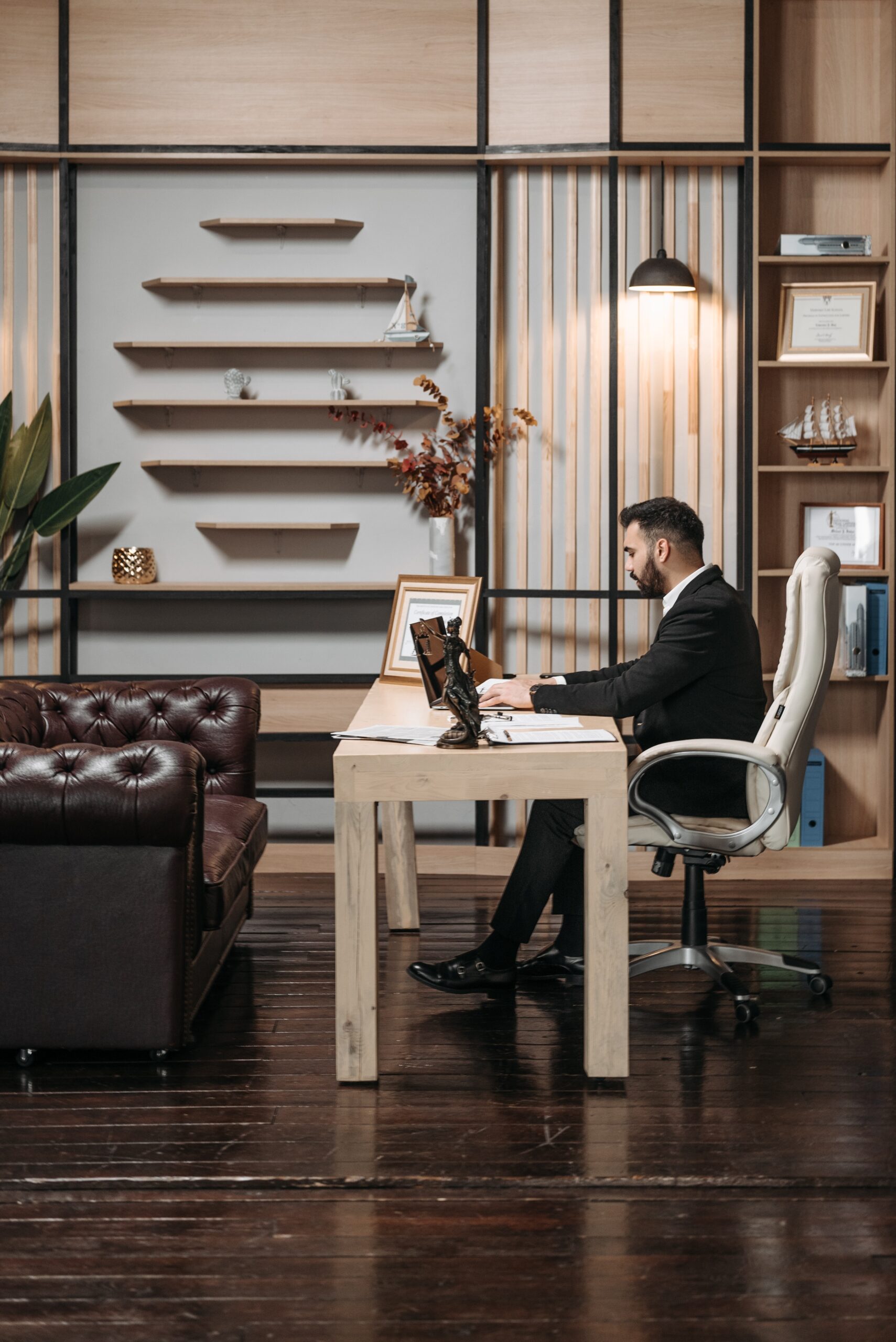 black executive desk with elegant office decor